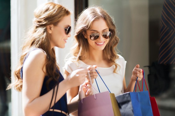 two women with shopping bags