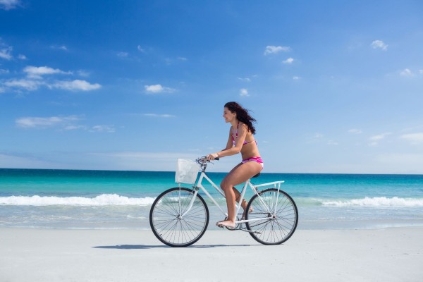 riding bike on beach